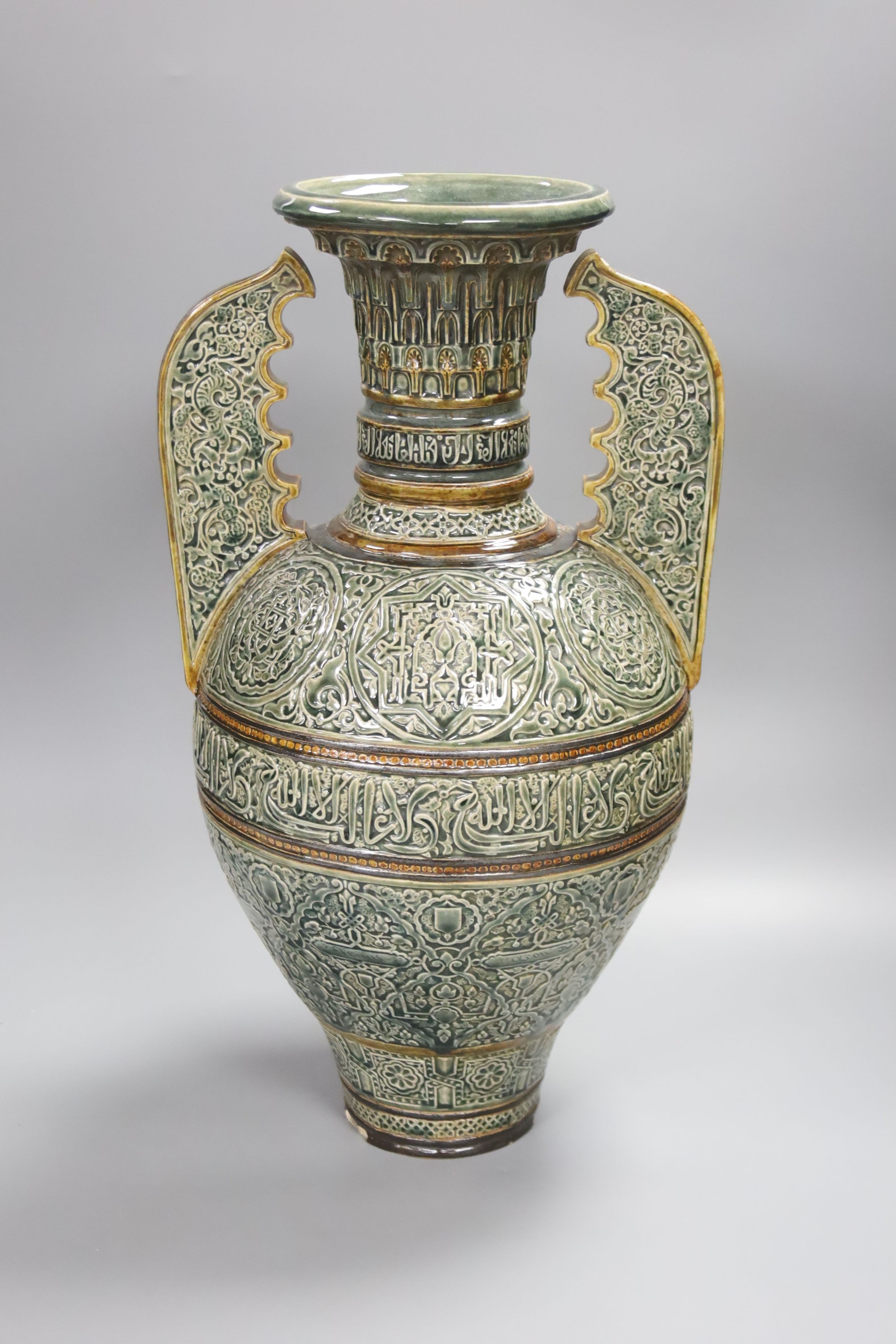 A large Doulton Lambeth Islamic inspired two handled glazed stoneware vase, dated 1880, 47cm, repairs